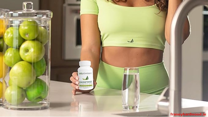 User holding MassZymes bottle from BiOptimizers